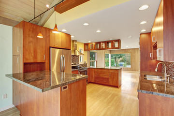 Beautiful kitchen with marble counters.