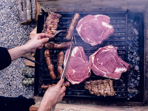 Italian barbecue with Bistecca alla Fiorentina, Salsiccia and cured pork
