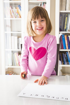 Portrait of smiling girl with stamp