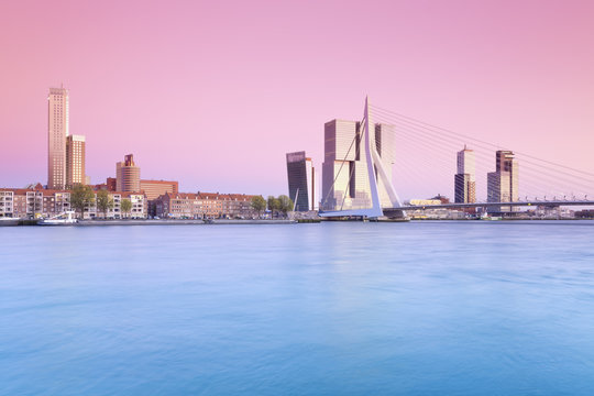Netherlands, County of Holland, Rotterdam, View to Erasmus bridge and the skyline in the evening