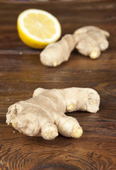 rhizome of ginger and spices on wooden table