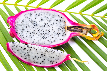 Dragon fruit on palm leaf