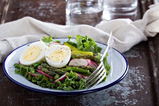 Fresh salad with lettuce, asparagus and eggs