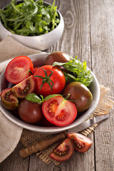Ripe fresh tomatoes in a bowl
