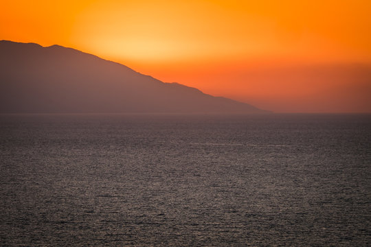 Mexico, Puerto Vallarta, Banderas Bay with Sierra Madre Mountains in the background after sunset