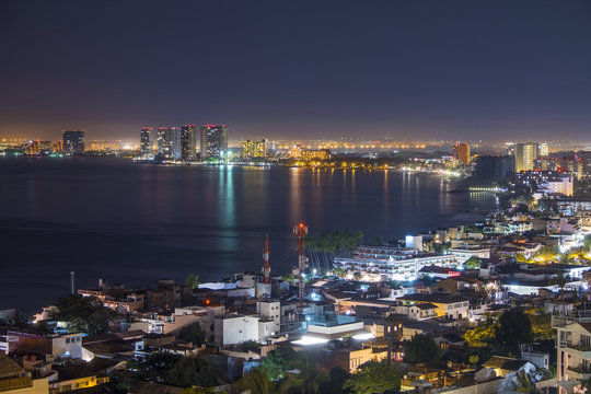 Mexico, Puerto Vallarta, at night, Banderas Bay with view at Hotel Zone