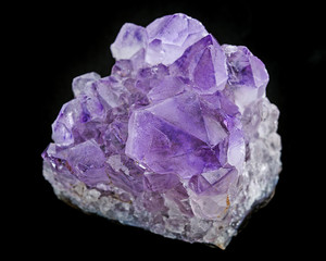 amethyst crystals on a black background