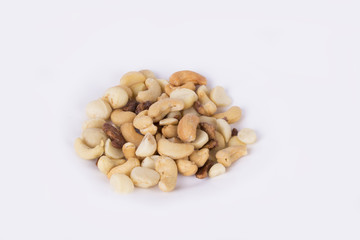 cashew / macadamia nuts / roasted almonds isolated on white background (studio)