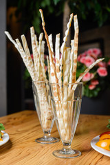 Salty bread snacks/Salty breadsticks in a glass on table