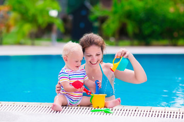 Mother and baby in a swimming pool