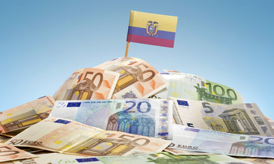 Flag of Ecuador sticking in a pile of various european banknotes
