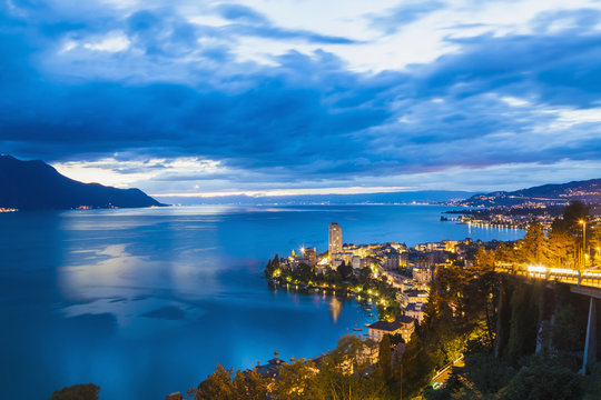 Switzerland, Lake Geneva, Montreux, cityscape at dusk