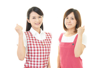 エプロンを着た女性