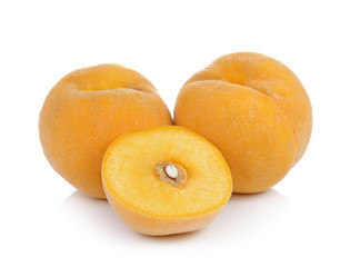  ripe yellow peach on white background