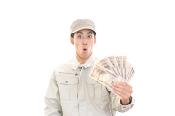 驚いた表情の労働者