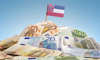 Flag of Mississippi sticking in a pile of various european bankn