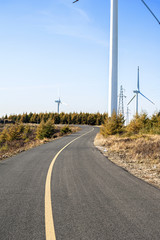 Fototapeta na wymiar Windmill and highway
