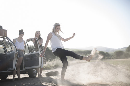 South Africa, Friends on a road trip frustrated with car breakdown