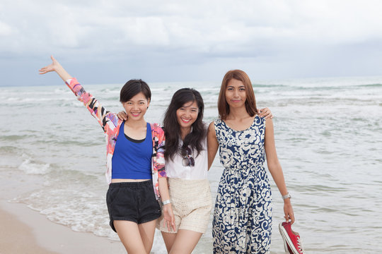portrai of asian woman friend group relaxing cacation on sea bea