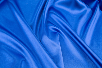 Close up of blue silk. Texture.
