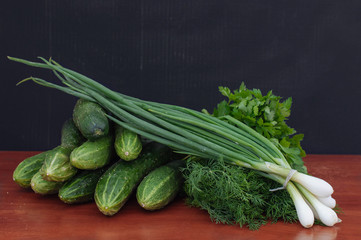 Cucumber green, onions and parsley