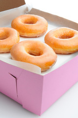Closeup of Glazed Donuts in a Box