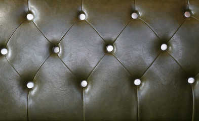 Background of a leather armchair dark green colour