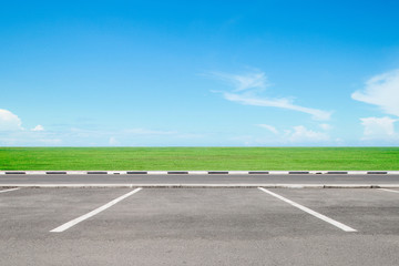 Empty parking area with sky  landscape