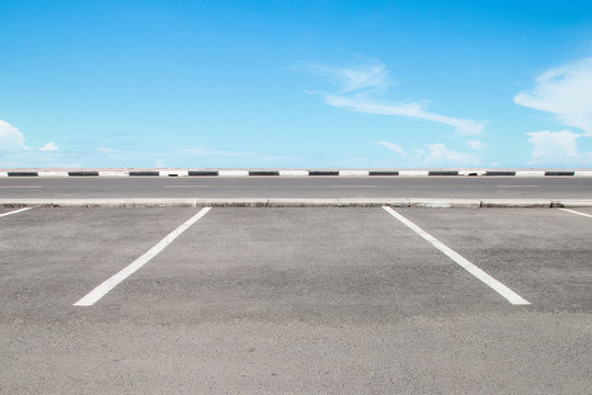 Empty parking area with sky  landscape