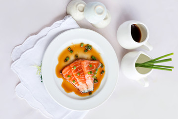 salmon on white dish