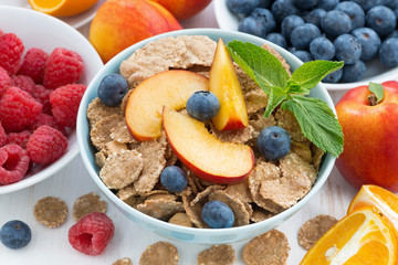 whole-grain flakes with fresh fruit and berries, top view