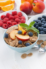 whole-grain flakes with fruit and berries, vertical, top view