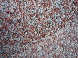 Pebble Stone Wall with small stones all over
