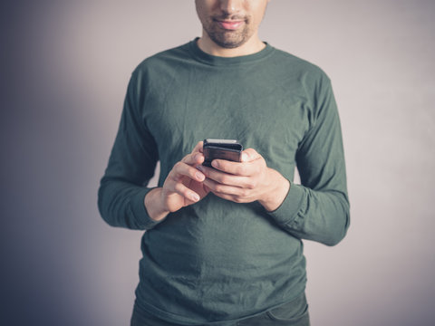 Young man using a smart phone