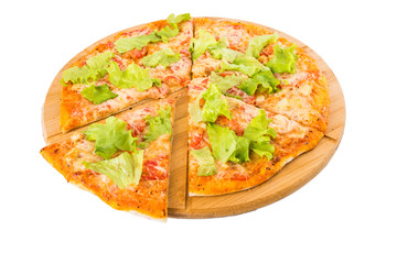 Tasty pizza on a wooden board
