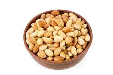 roasted peanuts in a bowl isolated