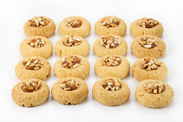 cookies with salted caramel and peanuts on a white background