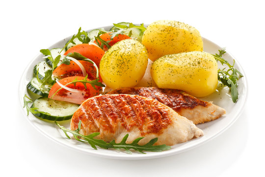 Grilled chicken fillets, boiled potatoes and vegetable salad 