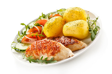 Grilled chicken fillets, boiled potatoes and vegetable salad 