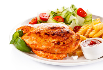 Fried chicken fillet, chips and vegetable salad 