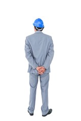 Businessman with helmet turning his back to camera
