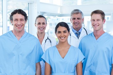 Fototapeta premium Team of smiling doctors looking at camera