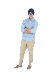 Fototapeta premium Geeky hipster with arms crossed looking at camera