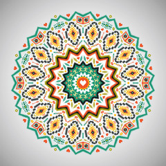 Ornamental round colorful geometric pattern in aztec style