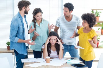 Fototapeta premium Concentrated businesswoman with her coworkers 
