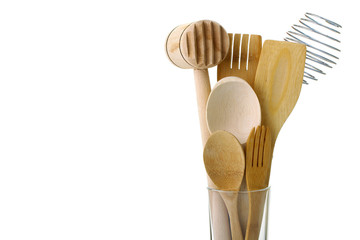 Wooden kitchen utensils isolated on white