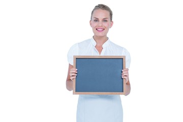 businesswoman holding a black board