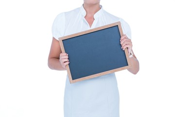 businesswoman holding a black board