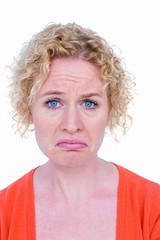 Unhappy blonde woman looking at camera 