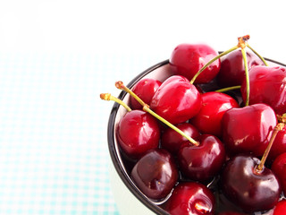 Cherries in a ceramic bowl